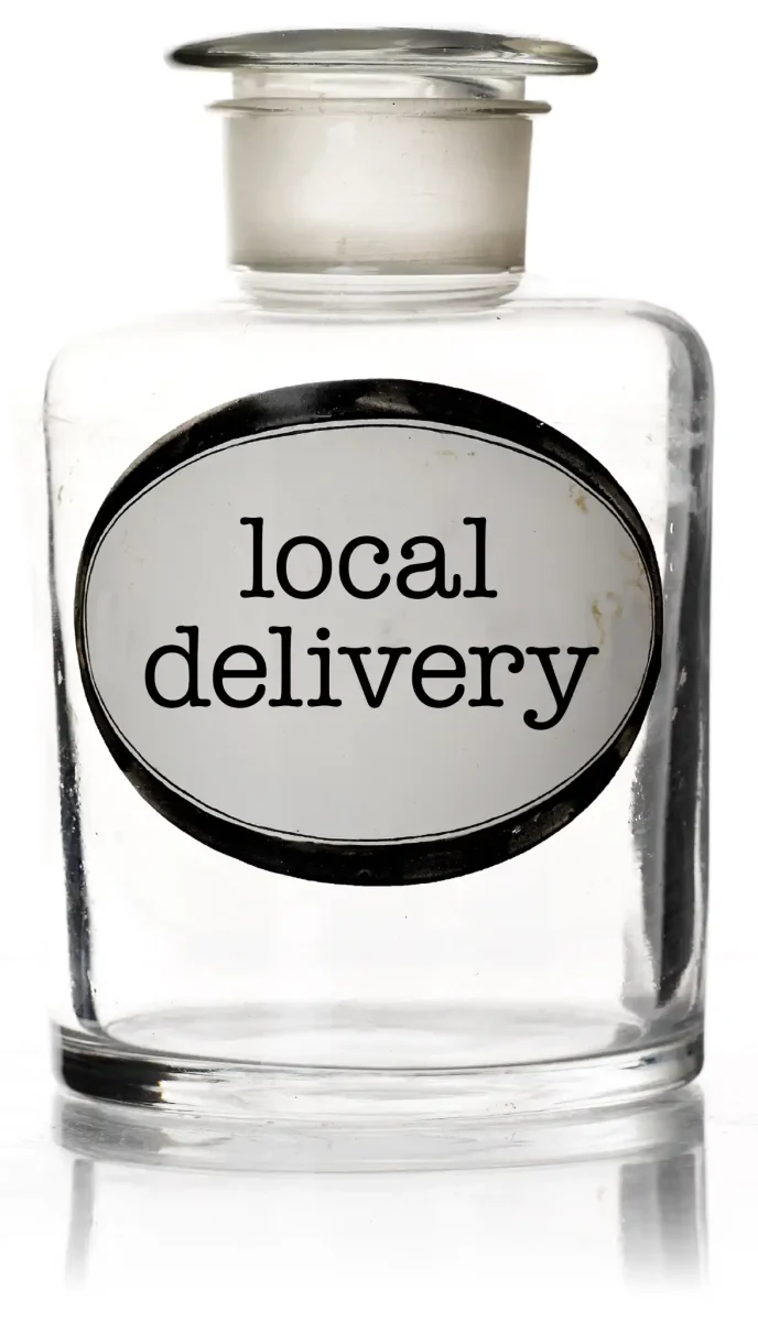 "local delivery" text on glass bottle